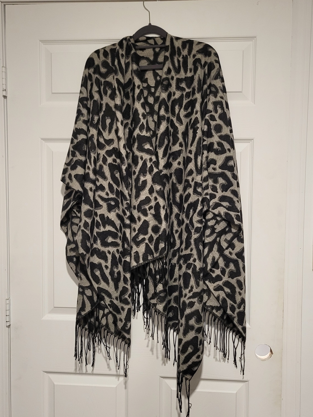 Leopard Print Fringe Poncho Wrap in Black and Cream